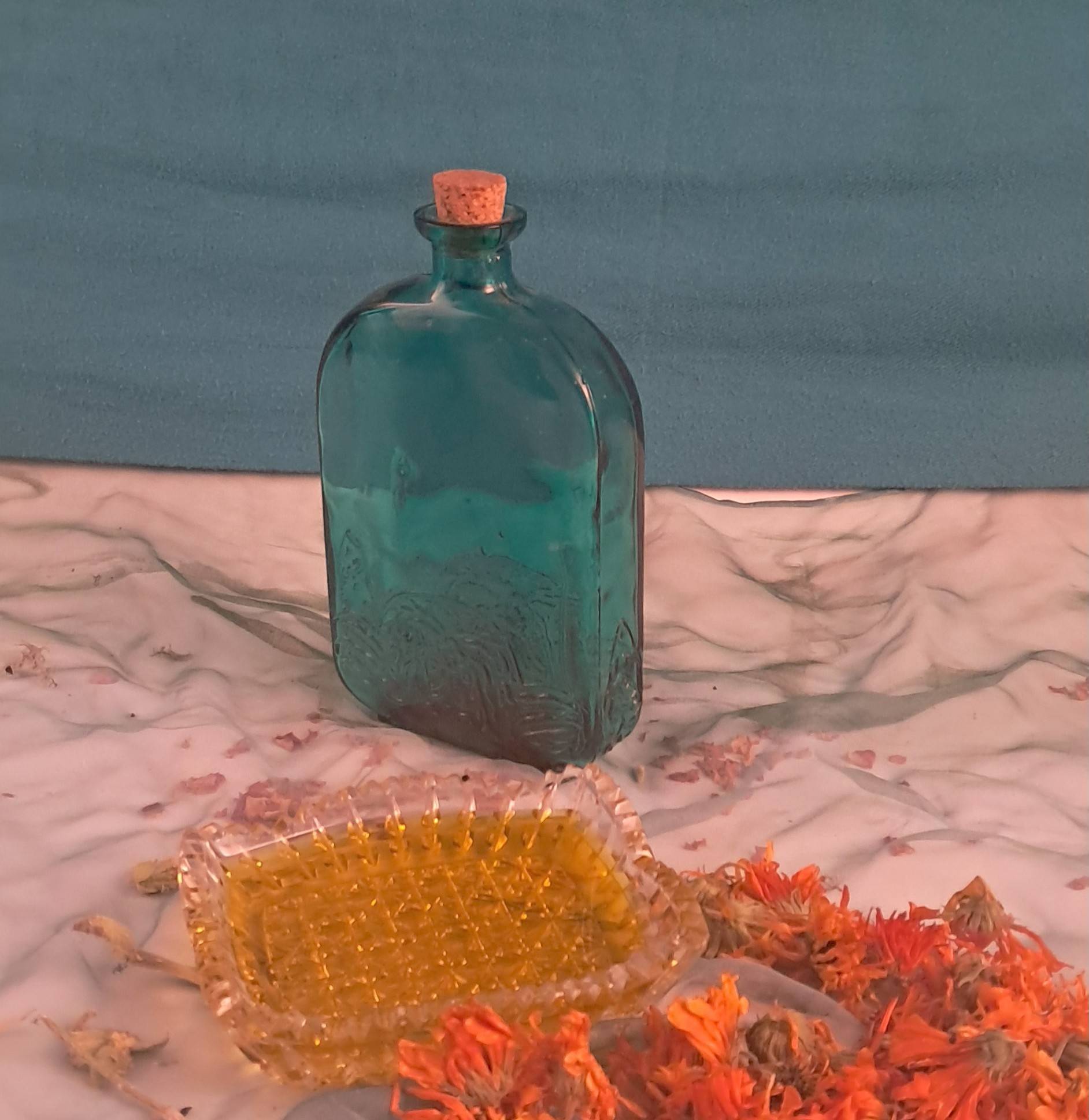 Calendula Infused oil in a green bottle