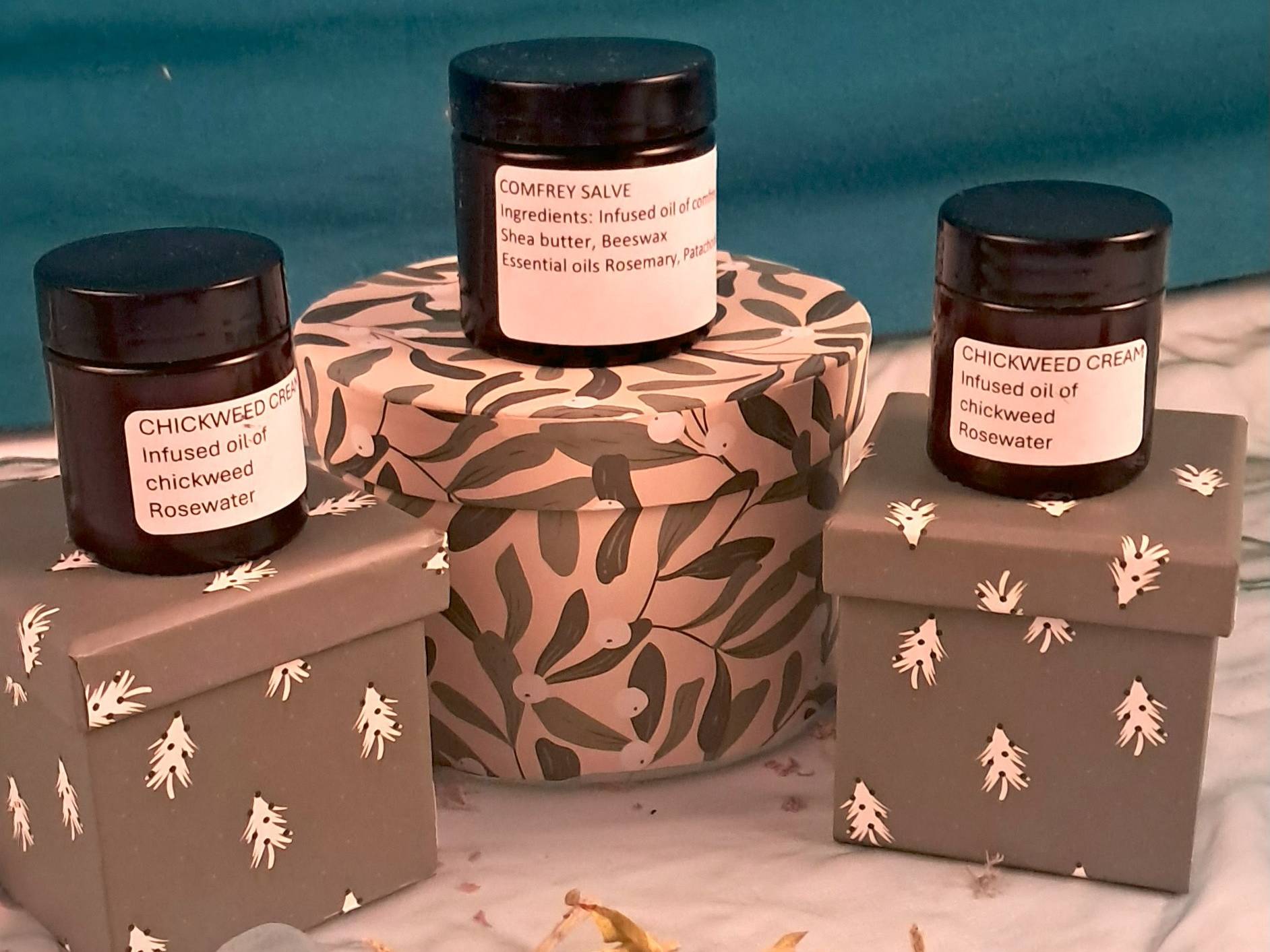 Home of Herbs healing creams, three cups